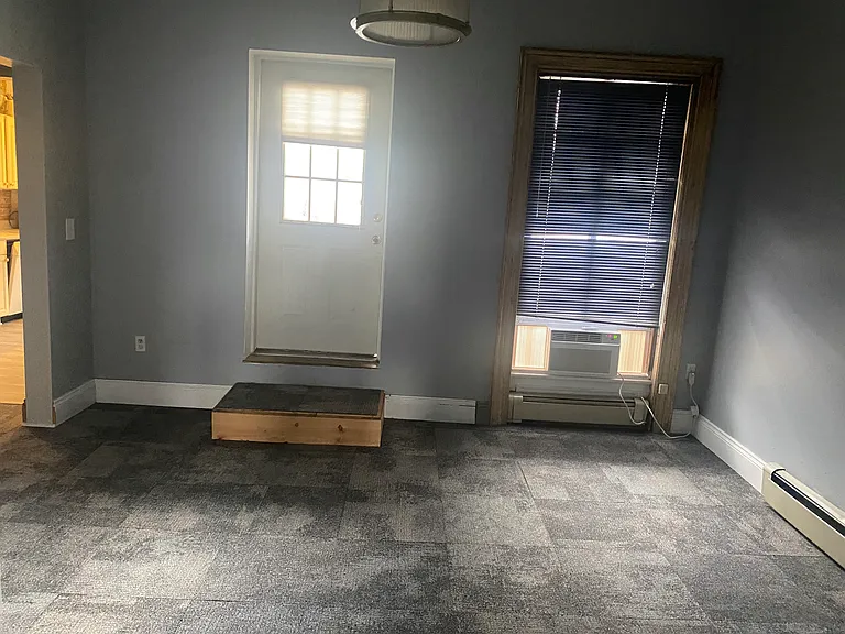 Dinning room or bedroom and door to private deck