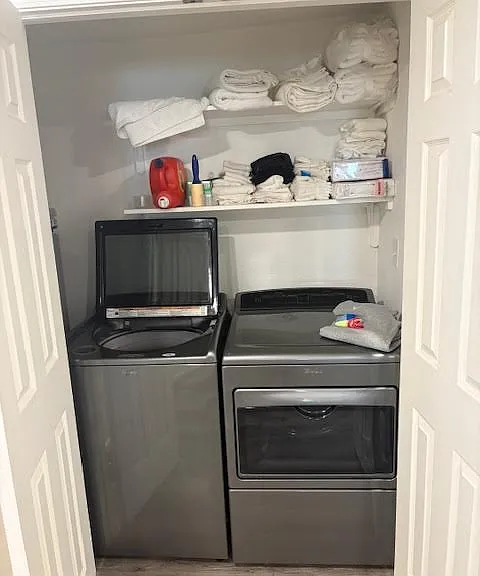 Washer & Dryer Setup with double closet doors.