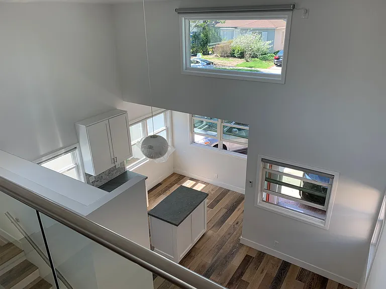 Loft is open to the downstairs living room and kitchen.