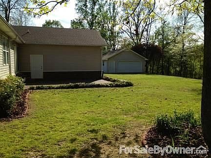 View of Back Patio with Detached Garage