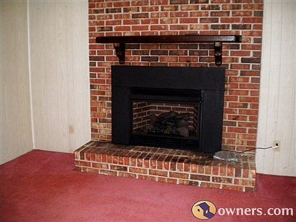 Gas logs w/thermostat control in great room.