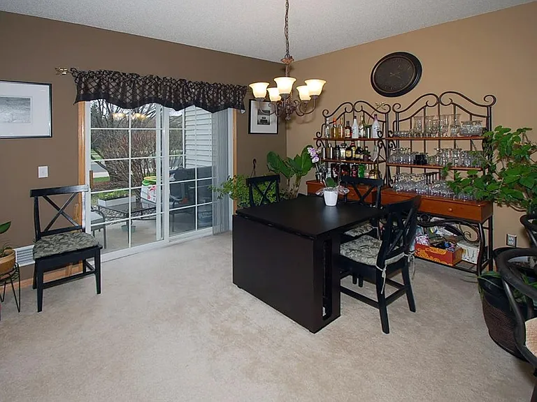 Dining room with sliding door to the private patio.