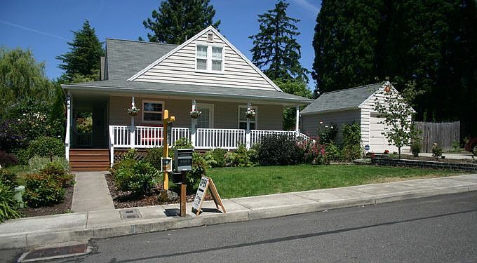 Farmhouse with wrap around Porch