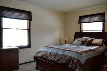 Main floor master bedroom has great closet space and an attached master bathroom.