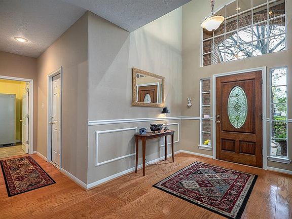 FOYER WITH TWO STORY CEILING