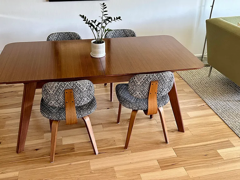 Dining table includes a leaf to seat 8