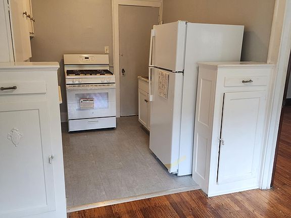 Kitchen Prep and Cooking Area - New Appliances (Range/Stove & Refrigerator) and New Sink and Fixtures
