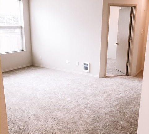 Living room and door to guest bedroom
