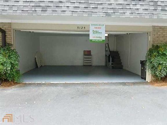 There is direct access from the private 2-car garage into th