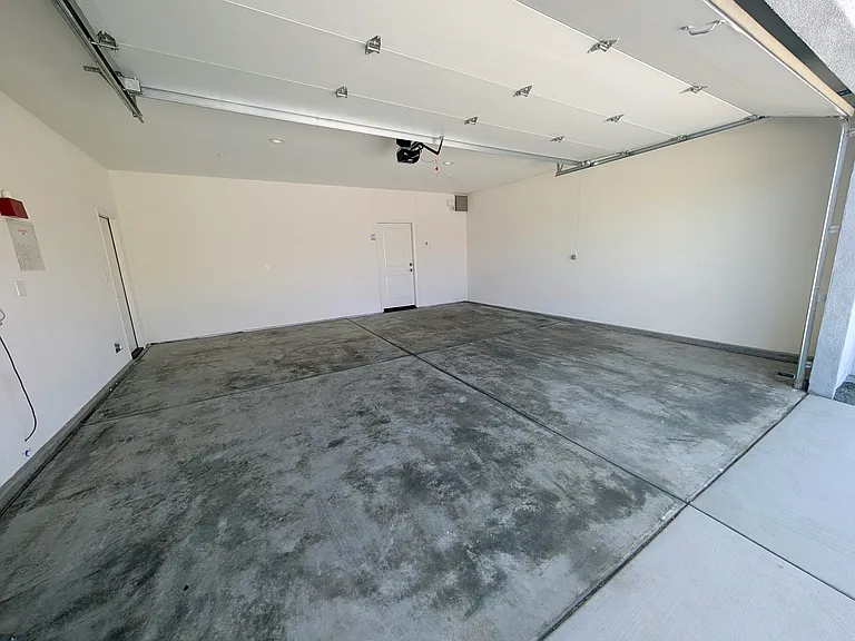 Large 2-car garage with 240 volt outlet for electric car charging