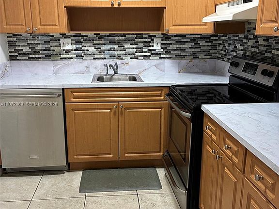 3rd image of 4675 W 18th Ct APT 904