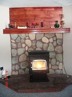 Corn Burning Fireplace in Family Room Gives off a TON of heat!