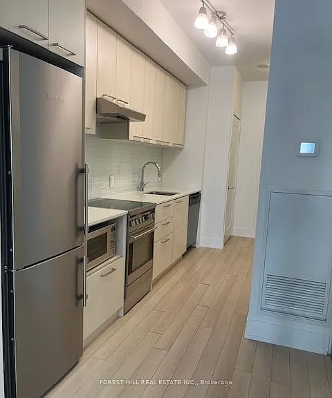 310 Tweedsmuir Ave #203 — Photo 11