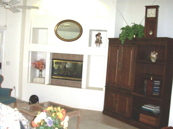 Two way gas fireplace accents the Great Room and the master bedroom.