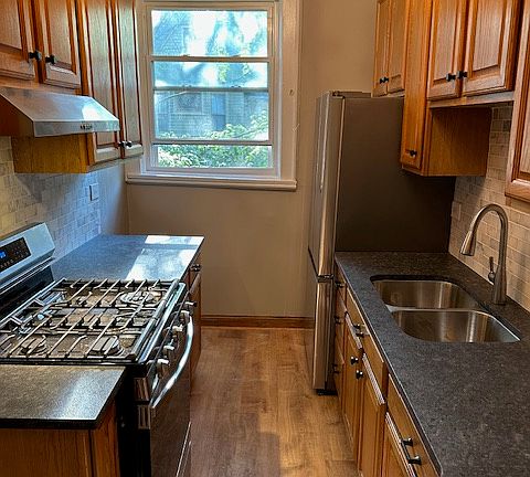 Newly remodeled kitchen. New appliances, granite countertops and marble backsplash