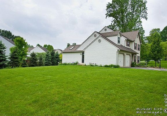 Side yard Lot is .42 acre  Tree lined back yard