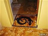 Lucky Gecko at family room entrance.