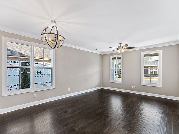 Living Room. These photos are for example purposes only. Not exact depiction of floorplan for sale.