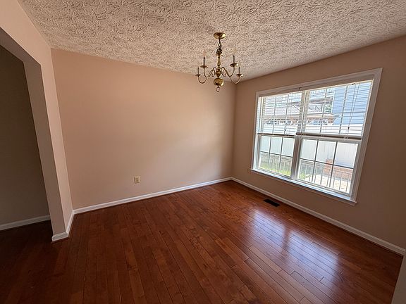 Dining Room with gleaming hardwood floors