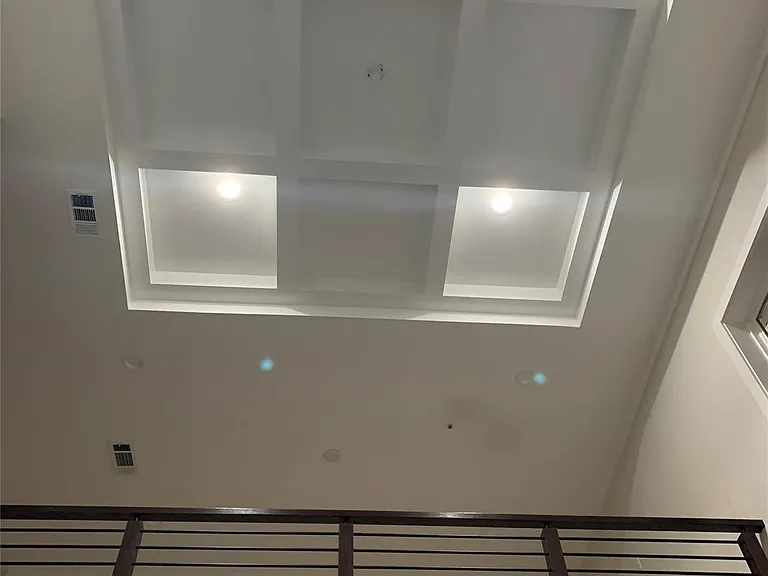 Beautiful soaring ceilings with design