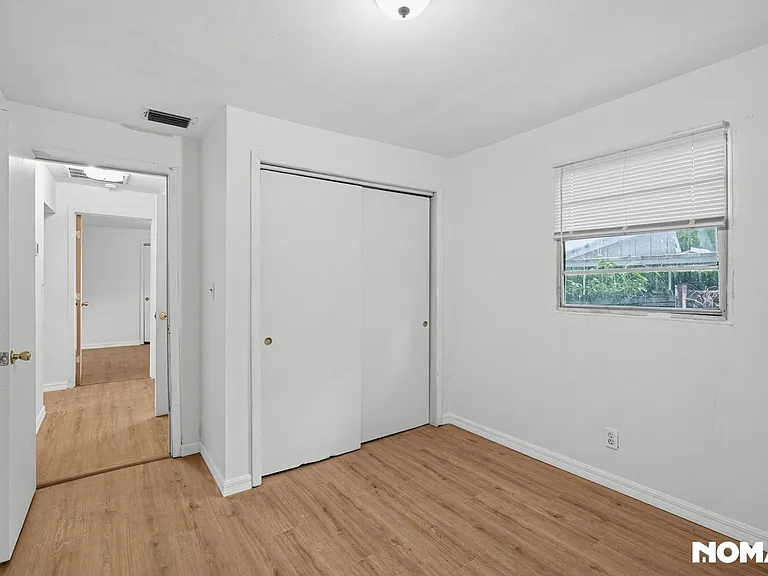 8915 N Orleans Ave — Photo 4