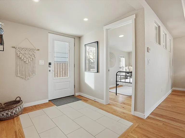 view from kitchen toward entry and office or 4th bed