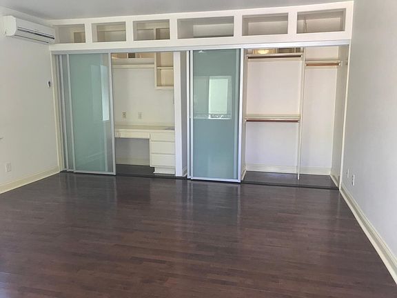 Closet and office space with sliding partitions.