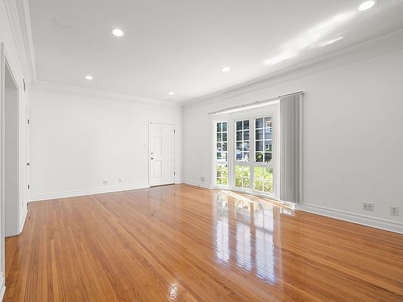 LARGE MAIN ROOM WITH REAL HARDWOOD FLOORS