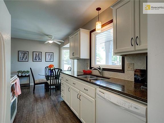 Nicely remodeled kitchen with quartz counter tops.