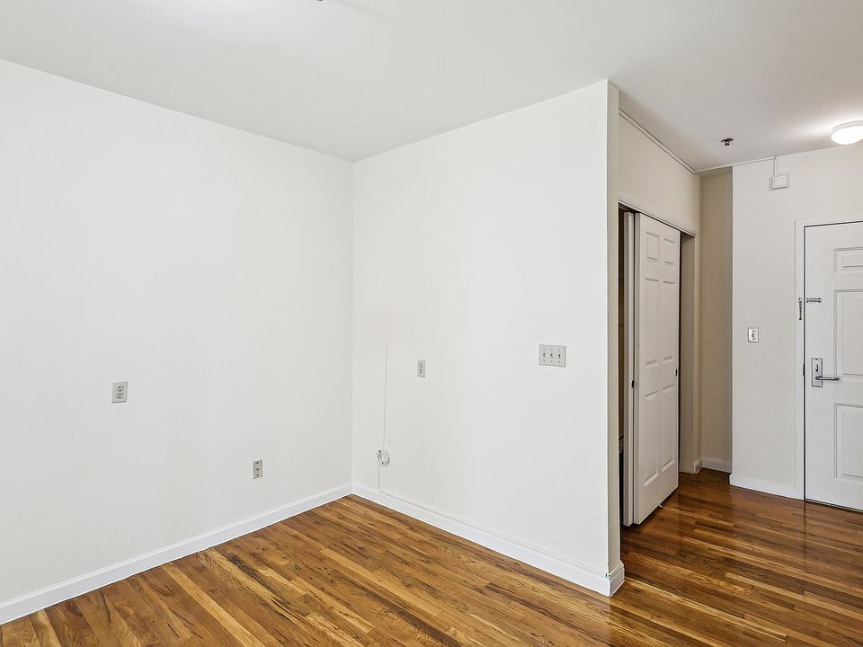 Dining room and entrance door of apartment.