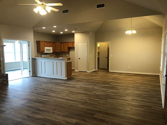 Living room, dining room and kitchen