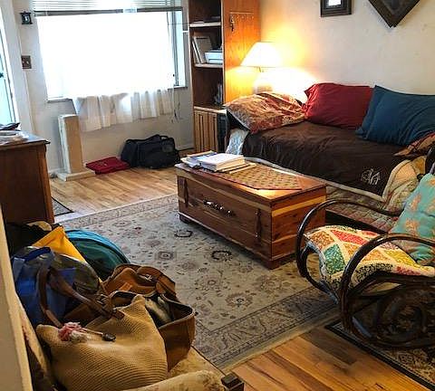 large living room with original hardwood floors