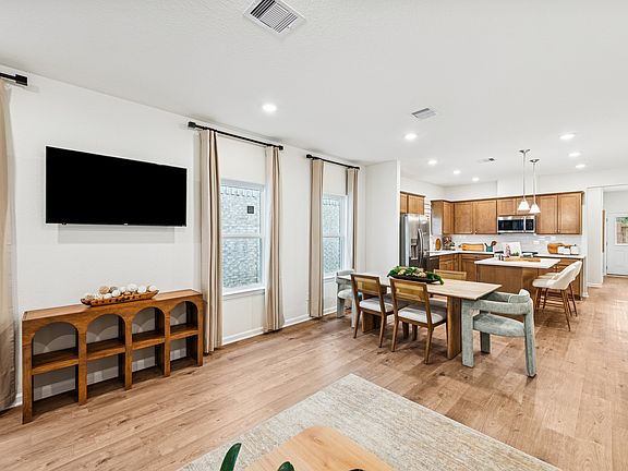 Family Room into Kitchen. Sample image for illustration upgrades, options, and colors may vary.