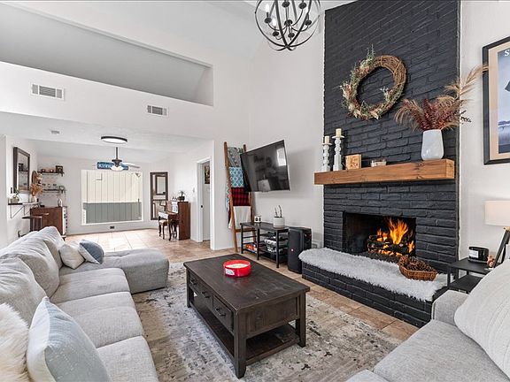 Spacious living room with working fireplace.