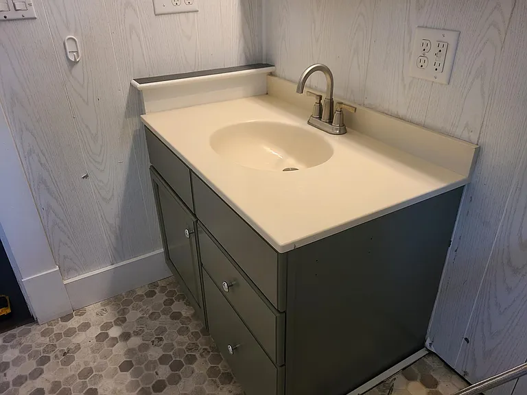 Bathroom will have new flooring. Will update photos as it comes along.
