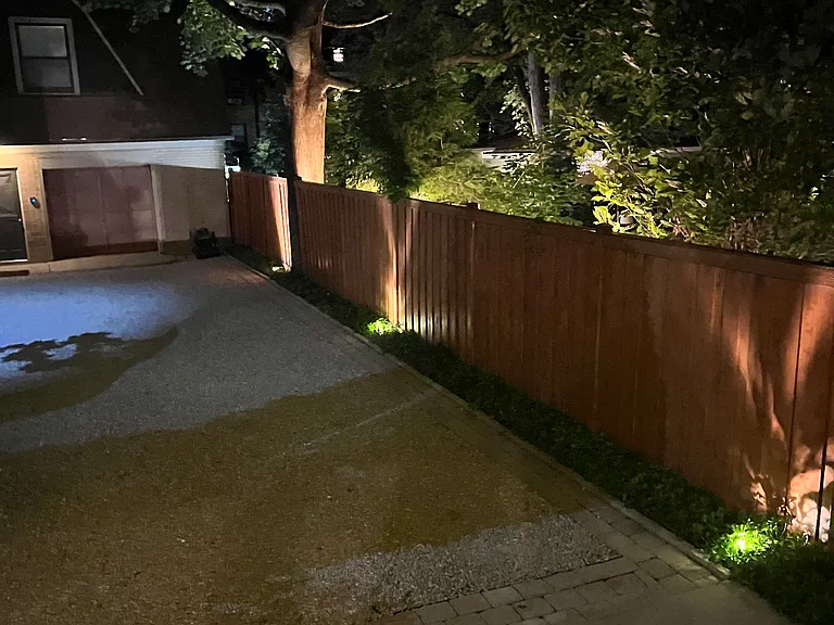 Night light is strategically positioned to enhance the natural beauty throughout the trees and landscaping for both personal enjoyment and also security
