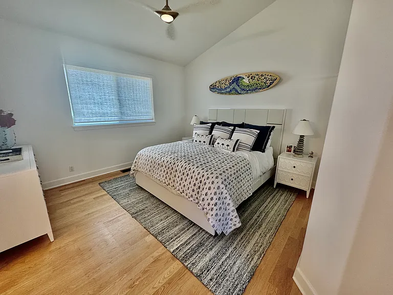 Upstairs guest bedroom, all new furniture, paint and an ensuite bathroom. Perfect for your guests and family members! Custom artwork from local galleries!