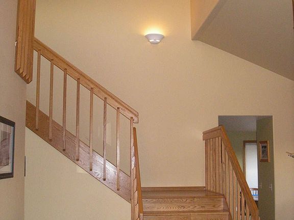 Entry with vaulted ceilings and skylights