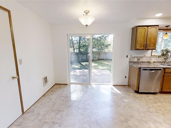 Door pictured leads to the attached one car garage.