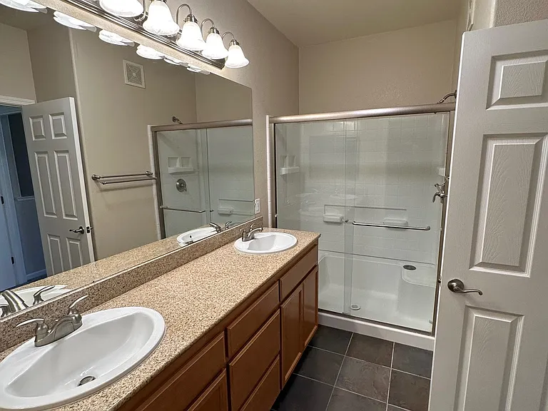 Bath 1 on top level, double sink, large shower