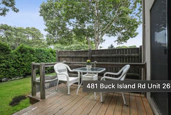 Kitchen slider lead to deck.