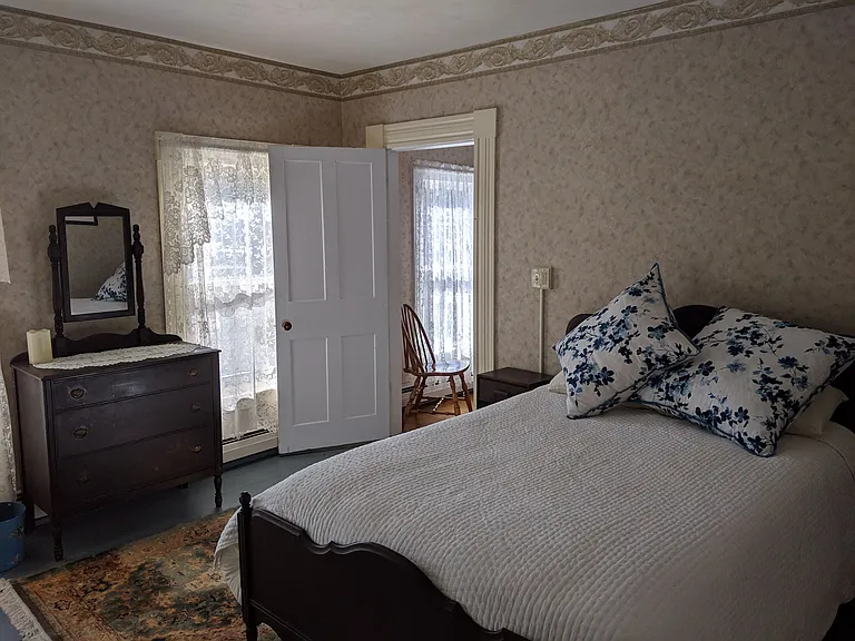 Bedroom 2, south facing windows look out over hay fields