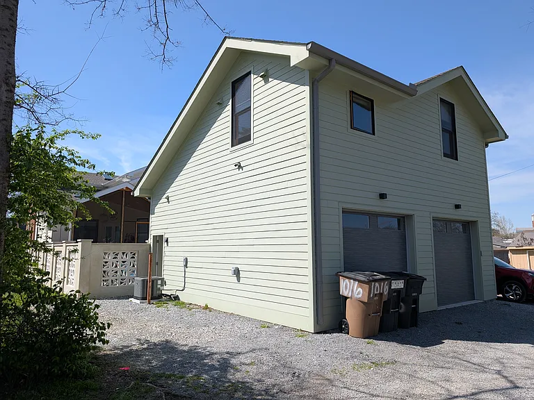 Tenant parking is next to the unit door.