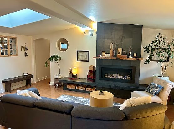 Living room with gas fireplace. Smart TV has been added since this photo.