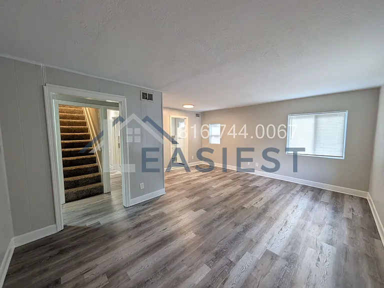 2129 E 77th Ter — Photo 3