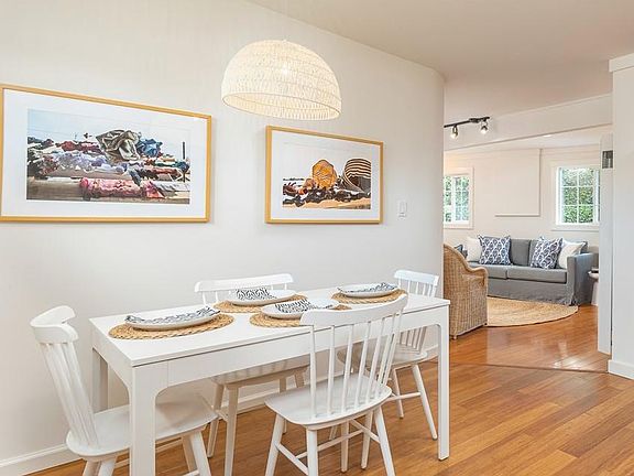 This is a staged photo of the kitchen and living room to show fit.