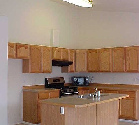 Open kitchen, cathedral ceilings
