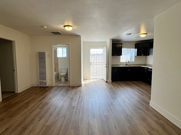 Entry Way to Open Concept Living Room/Kitchen