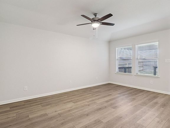 Living room in the Callaghan floorplan at a Meritage Homes community.