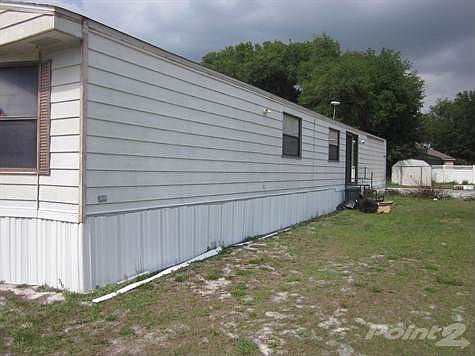 OPPOSITE SIDE VIEW OF HOME